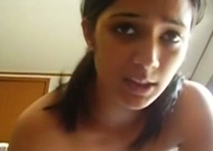Sweet Indian chick sucks her lover's chocolate penis like mad